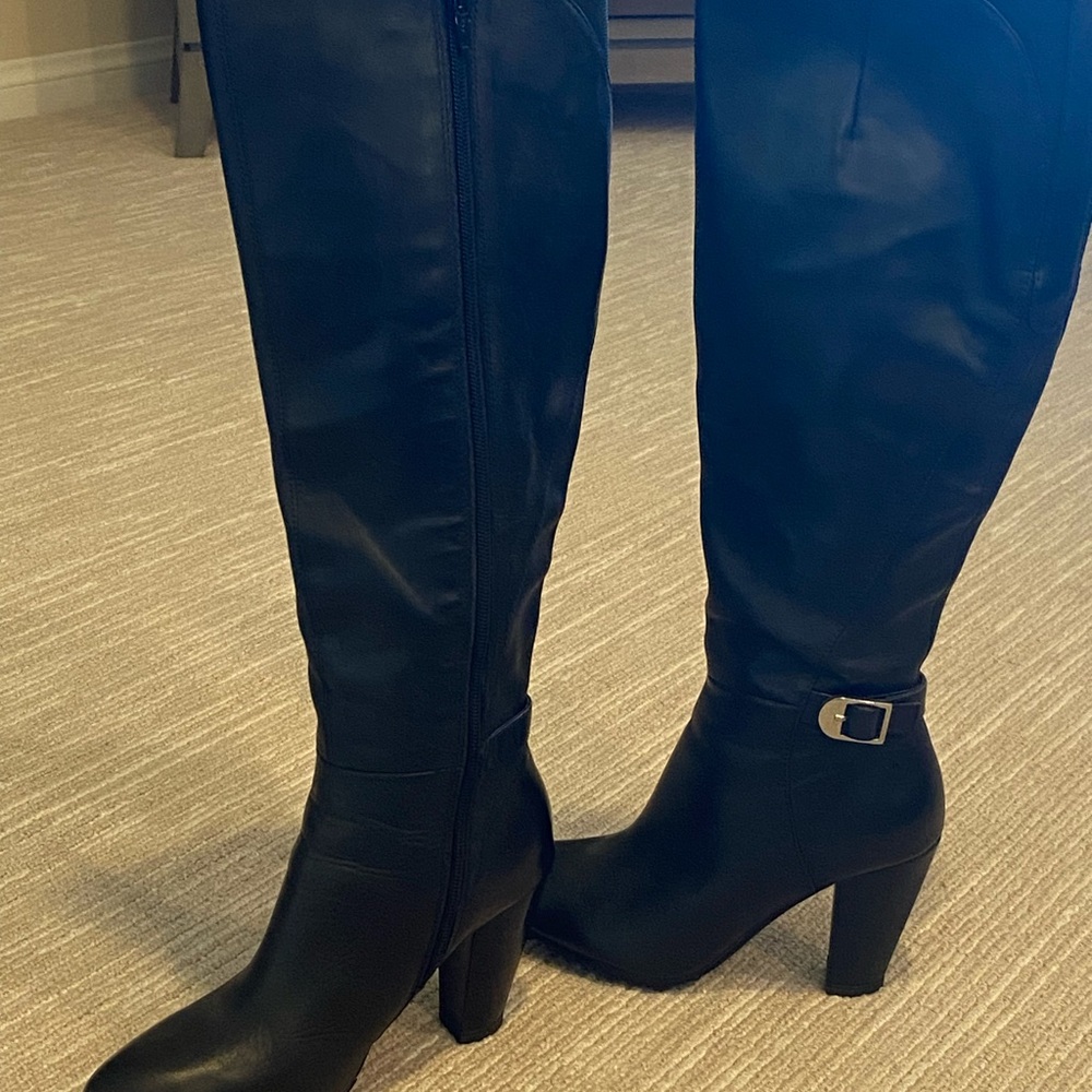 Marc Fisher tall leather heel boot. Rubber good grip sole. Size 5 1/2.